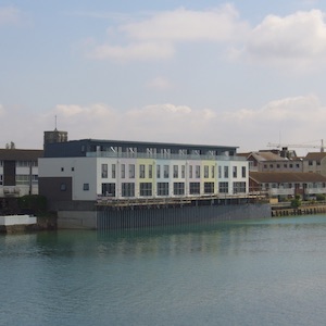 Eight townhouses overlooking river Adur
